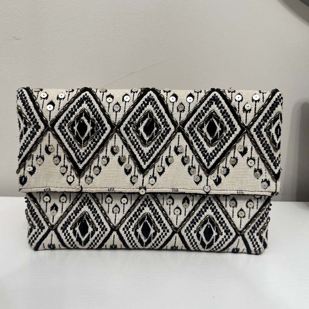 Vintage Clutch on chain. Removable chains attached. In great condition.